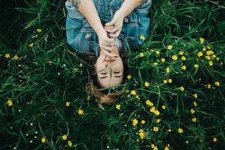 Pic of woman lying in field