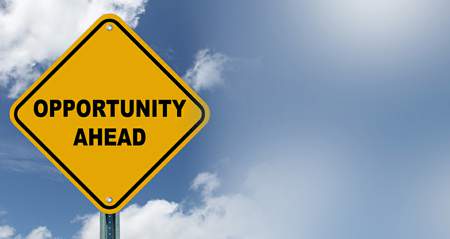 Ethics of Opportunities yellow road sign with the words opportunity ahead