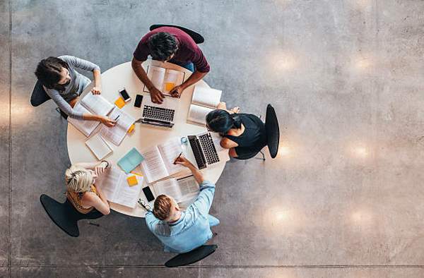 people working together around a round table