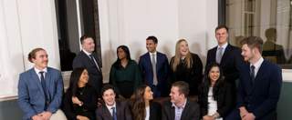 group photo of young ambassadors laughing together